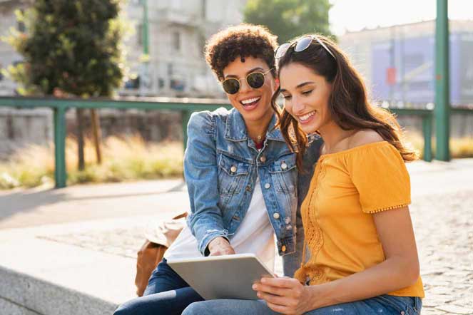 multicultural audience engages with bilingual digital ads on a tablet